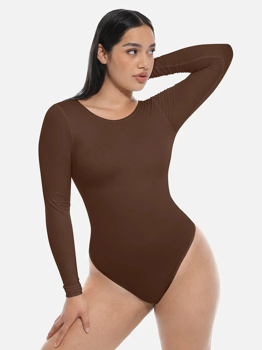 Woman modeling brown long sleeve shapewear bodysuit on white background